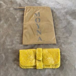 Moyna beaded yellow clutch.